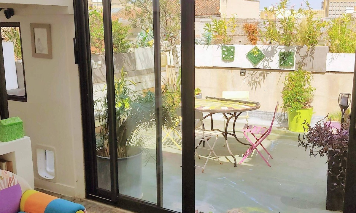 Baille Apartment | Terrace and veranda: a garden on the 5th floor, atypical and cocooning.