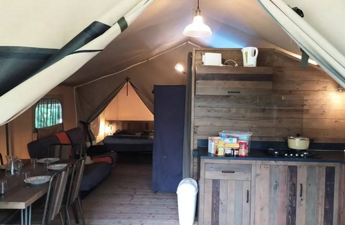 Saint Maime House | Flower Camping La Rivière * - Lodge on stilt Comfort 46m2 (2 bedrooms) + covered terrace 10m2 5 to 7 people - 5 pers. included in the tariff