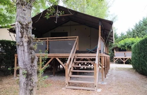 Saint Maime House | Flower Camping La Rivière * - Lodge on stilt Comfort 46m2 (2 bedrooms) + covered terrace 10m2 5 to 7 people - 5 pers. included in the tariff