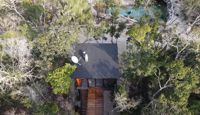 Maya Eco-Tower Oasis: Elevate your living amidst nature, steps from Cenote!