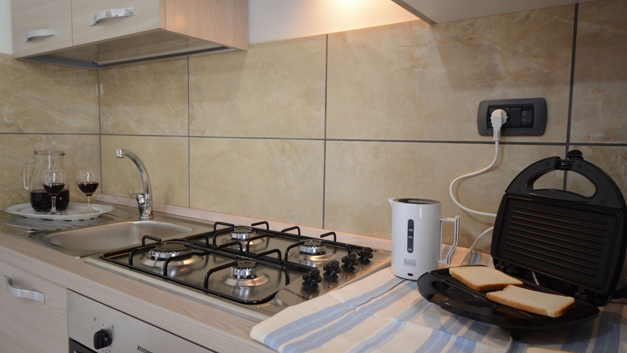 Photo of Kitchen in Piazza-Tralia-Pendolo