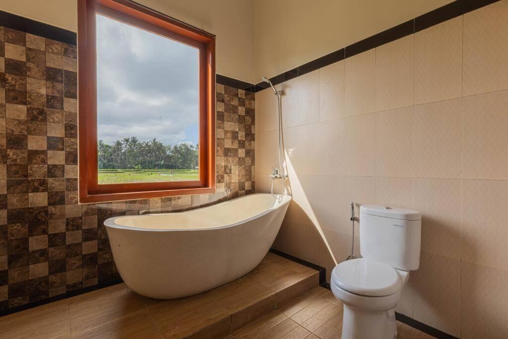 Photo of Bathroom in Singakerta