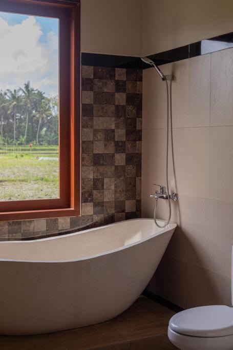 Photo of Bathroom in Singakerta