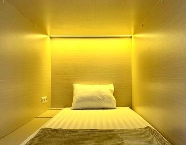 Single Bed in Dormitory Room